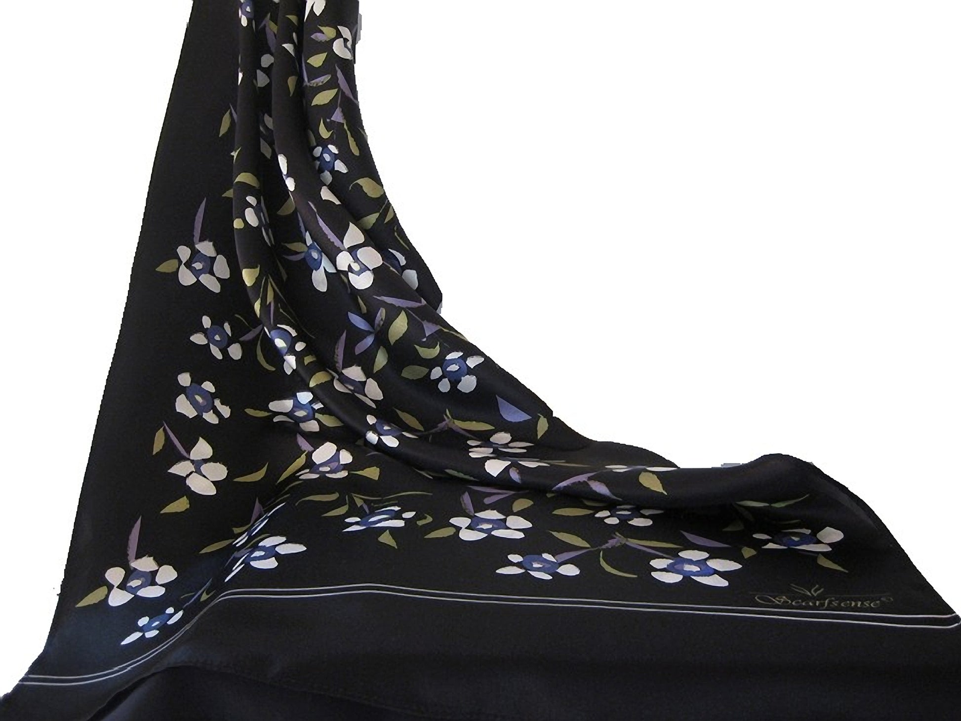 Lightweight silk scarf with white floral pattern on black background soft flowing drape