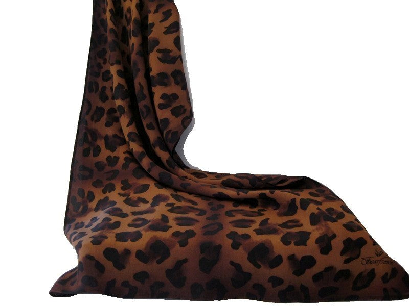 Lightweight animal print silk scarf with earthy brown tones soft flowing drape
