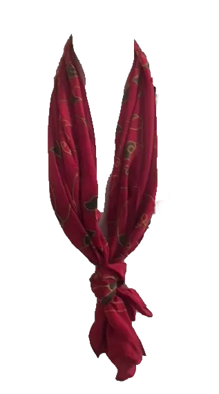 Red silk scarf tied in classic neck style for festive seasonal wear